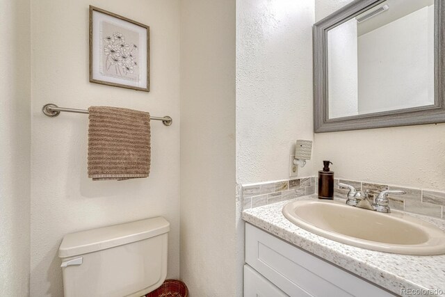 2028 Palm Dr, Colorado Springs, CO 80918 - bathroom with toilet and vanity