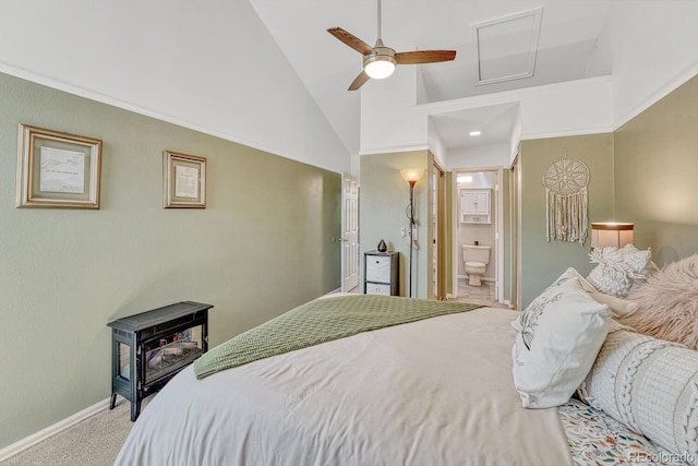 2028 Palm Dr, Colorado Springs, CO 80918 - carpeted bedroom with connected bathroom, high vaulted ceiling, and a ceiling fan