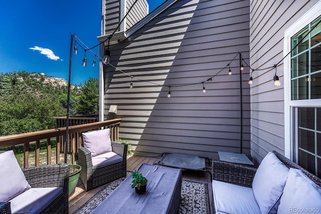 2028 Palm Dr, Colorado Springs, CO 80918 - wooden deck featuring outdoor lounge area