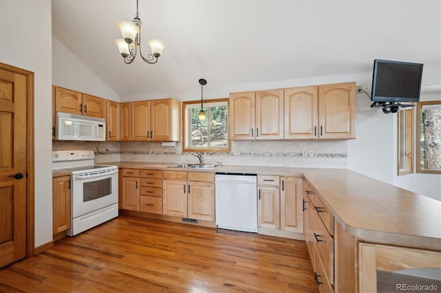 84 Sunny Ridge Ln, Bailey, CO 80421 - kitchen with white appliances, light brown cabinets, and vaulted ceiling