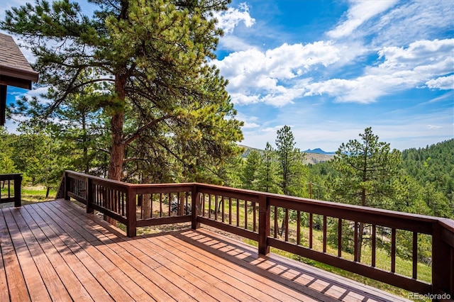 84 Sunny Ridge Ln, Bailey, CO 80421 - deck with a forest view and a mountain view
