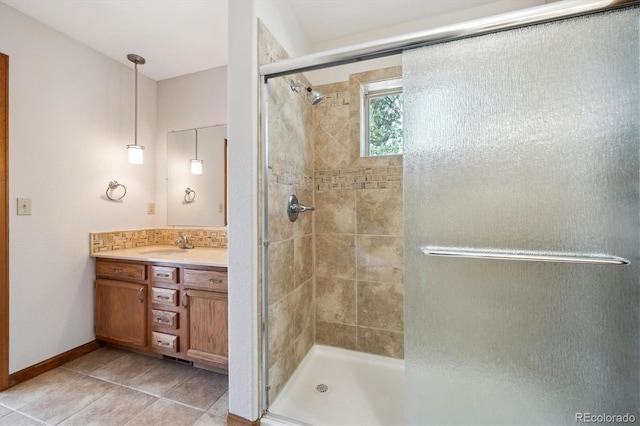 84 Sunny Ridge Ln, Bailey, CO 80421 - bathroom with a stall shower, vanity, and tile patterned flooring