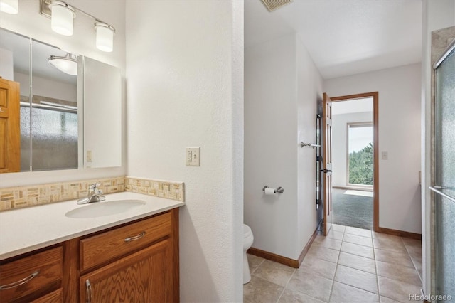 84 Sunny Ridge Ln, Bailey, CO 80421 - bathroom featuring vanity, tile patterned flooring, and an enclosed shower