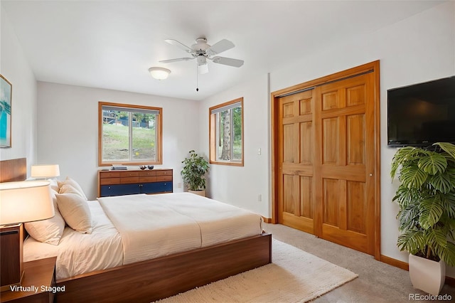 84 Sunny Ridge Ln, Bailey, CO 80421 - carpeted bedroom with a closet and a ceiling fan