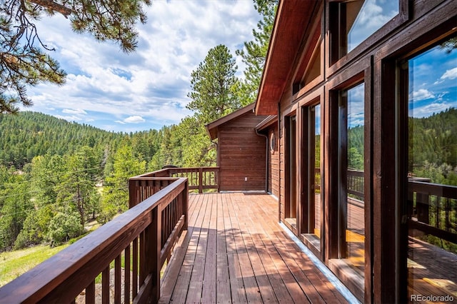 84 Sunny Ridge Ln, Bailey, CO 80421 - deck featuring a view of trees