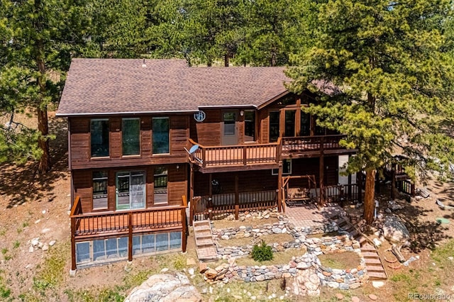 84 Sunny Ridge Ln, Bailey, CO 80421 - back of property with a shingled roof and a deck