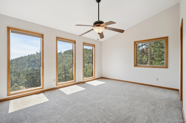84 Sunny Ridge Ln, Bailey, CO 80421 - carpeted empty room with lofted ceiling and ceiling fan