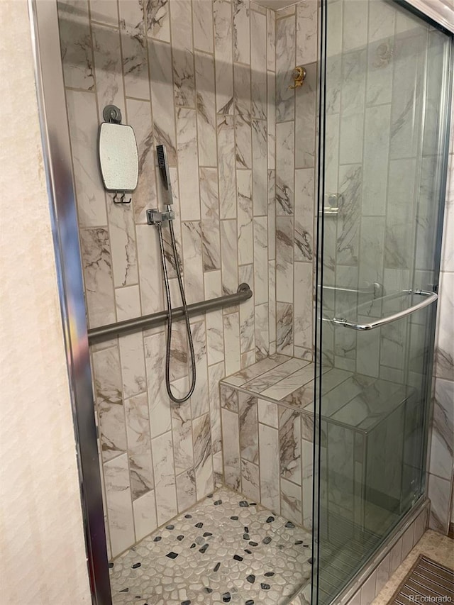 3675 S Cherokee St Unit 710, Englewood, CO 80110 - full bathroom featuring a shower stall