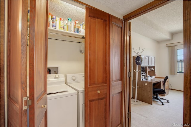 3675 S Cherokee St Unit 710, Englewood, CO 80110 - washroom with a textured ceiling, separate washer and dryer, light carpet, and an office area