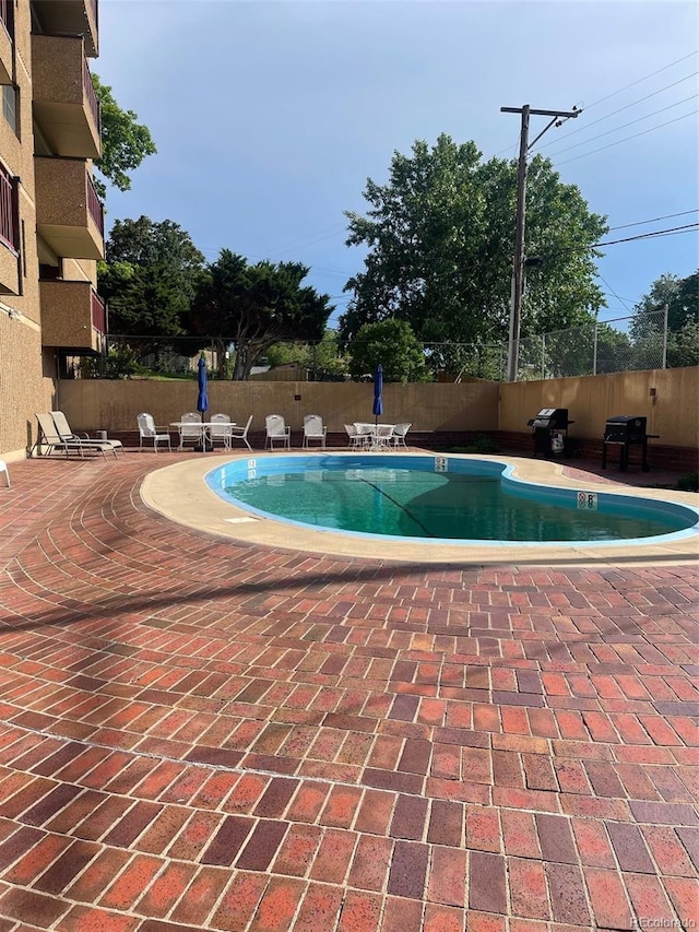 3675 S Cherokee St Unit 710, Englewood, CO 80110 - community pool with a patio