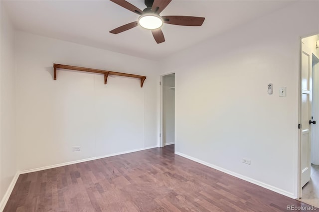 5090 Tejon St, Denver, CO 80221 - spare room featuring a ceiling fan, wood finished floors, and baseboards