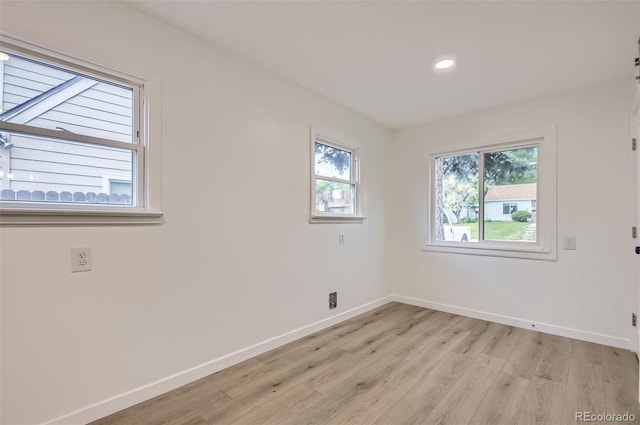5090 Tejon St, Denver, CO 80221 - spare room with healthy amount of natural light, light wood finished floors, baseboards, and recessed lighting
