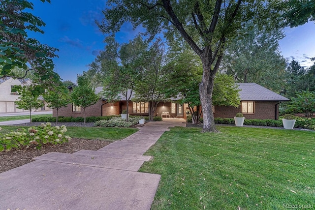 view of front of home with a front lawn