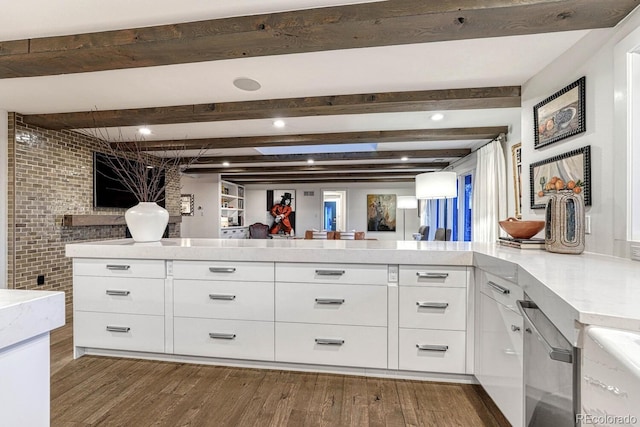 bathroom featuring vanity, wood finished floors, and beamed ceiling