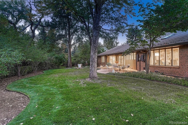 view of yard with a patio area