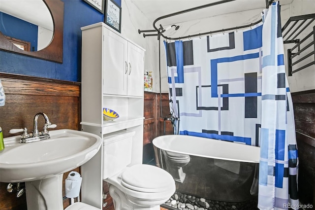 3811 N Clay St, Denver, CO 80211 - full bath featuring toilet, a sink, a freestanding tub, and curtained shower