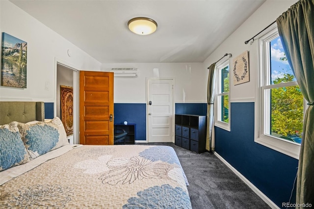 3811 N Clay St, Denver, CO 80211 - carpeted bedroom with baseboards and a wall mounted AC