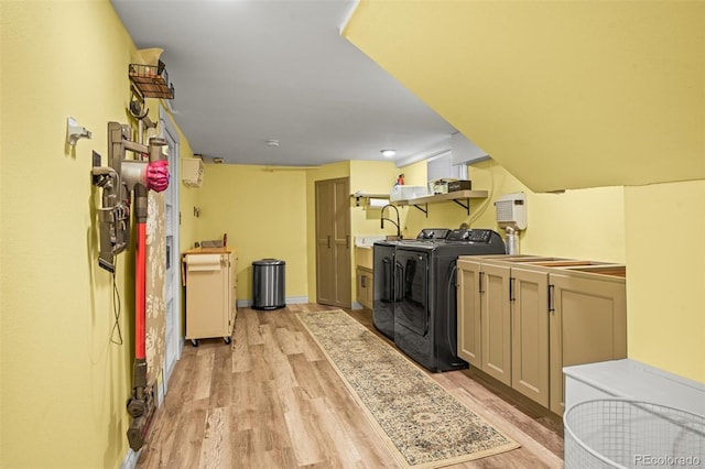 3811 N Clay St, Denver, CO 80211 - laundry room with washer and dryer and light wood-style floors