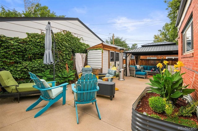 3811 N Clay St, Denver, CO 80211 - view of patio / terrace with a shed, a gazebo, an outbuilding, fence, and outdoor lounge area
