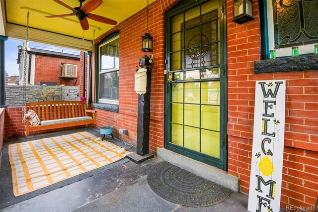 3811 N Clay St, Denver, CO 80211 - doorway to property with brick siding, a porch, and ceiling fan
