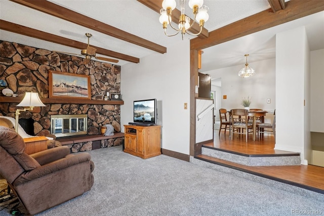 11349 Downing Dr, Northglenn, CO 80233 - living area with a chandelier, carpet flooring, a stone fireplace, and beam ceiling