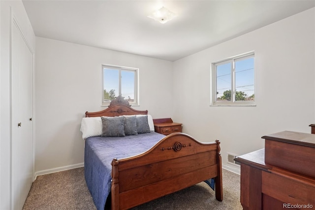 11349 Downing Dr, Northglenn, CO 80233 - carpeted bedroom with baseboards