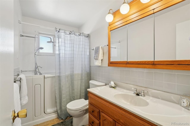11349 Downing Dr, Northglenn, CO 80233 - full bath with a shower with curtain, vanity, decorative backsplash, and tile walls