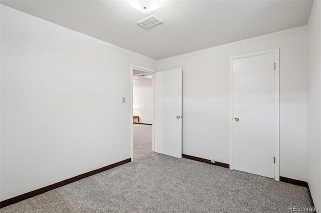 11349 Downing Dr, Northglenn, CO 80233 - unfurnished bedroom featuring carpet floors and baseboards