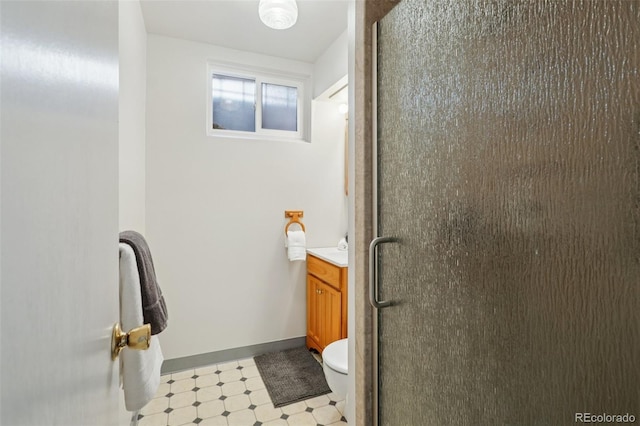 11349 Downing Dr, Northglenn, CO 80233 - bathroom featuring vanity, tile patterned floors, and a shower stall
