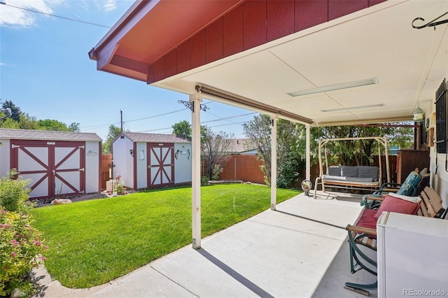 11349 Downing Dr, Northglenn, CO 80233 - fenced backyard with a shed, a patio, and an outdoor living space