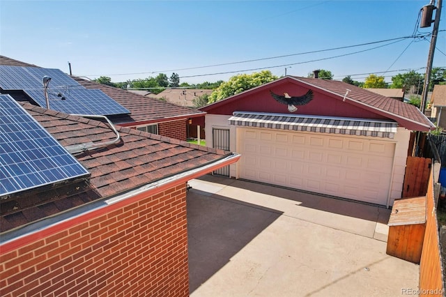 11349 Downing Dr, Northglenn, CO 80233 - detached garage with roof mounted solar panels