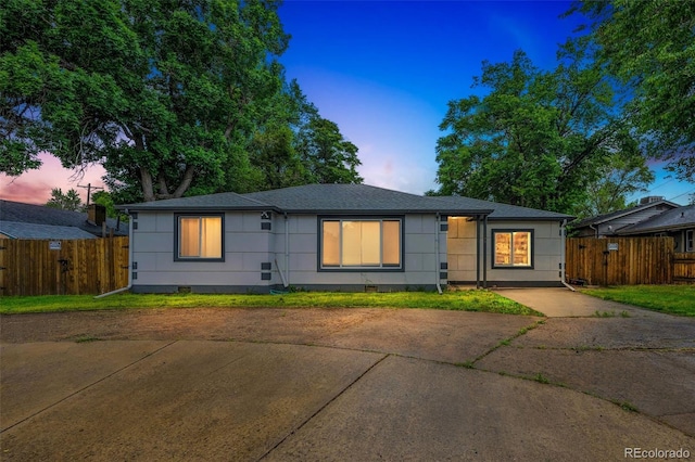 7010 W 44th Ave, Wheat Ridge, CO 80033 - view of front of home featuring crawl space, roof with shingles, and driveway