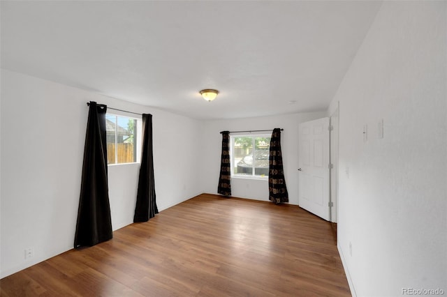 7010 W 44th Ave, Wheat Ridge, CO 80033 - empty room featuring wood finished floors