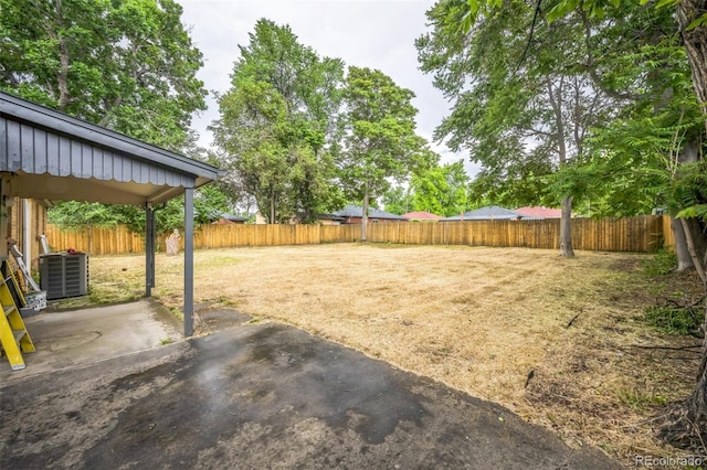 7010 W 44th Ave, Wheat Ridge, CO 80033 - fenced backyard with a patio area