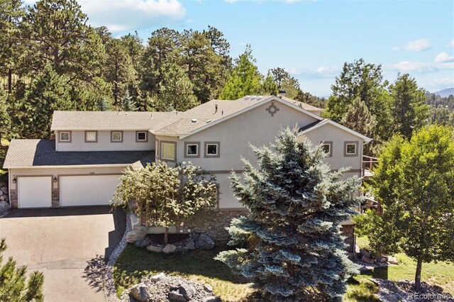 view of front of property featuring a garage