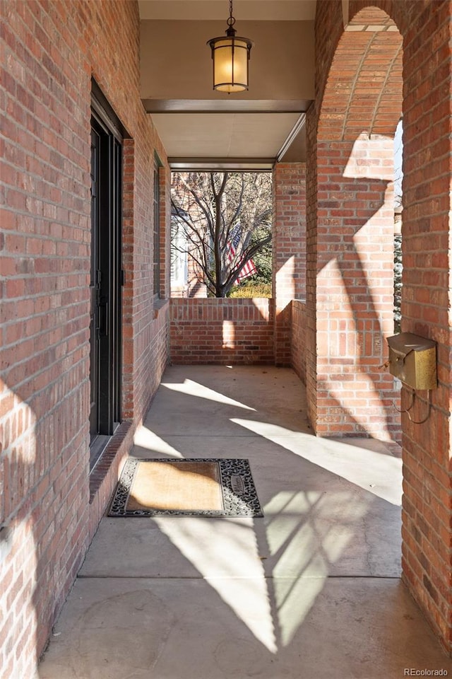 view of patio featuring a porch