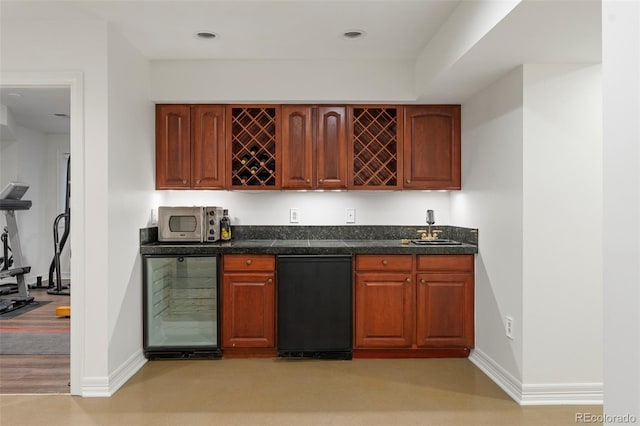 bar featuring fridge and sink