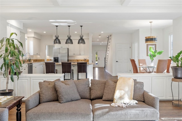 living room featuring dark wood-type flooring