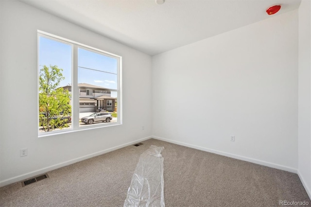 9061 Telluride Ct, Commerce City, CO 80022 - carpeted spare room featuring baseboards