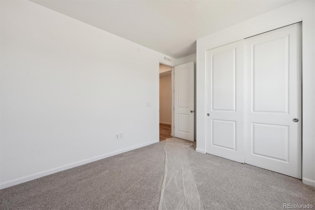 9061 Telluride Ct, Commerce City, CO 80022 - unfurnished bedroom with carpet flooring, baseboards, and a closet