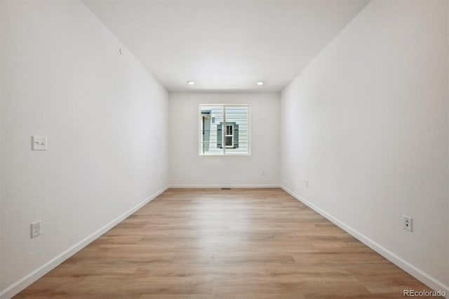 9061 Telluride Ct, Commerce City, CO 80022 - spare room with light wood finished floors and baseboards