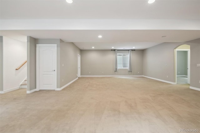 1235 S Balsam St, Lakewood, CO 80232 - finished basement with recessed lighting, light colored carpet, arched walkways, baseboards, and stairs