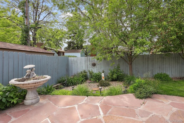 1235 S Balsam St, Lakewood, CO 80232 - fenced backyard with a patio