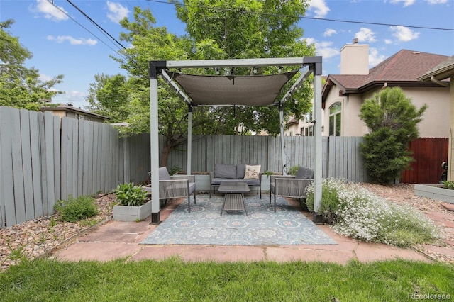 1235 S Balsam St, Lakewood, CO 80232 - fenced backyard featuring outdoor lounge area and a patio