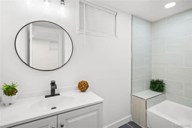 2996 S Sheridan Blvd, Denver, CO 80227 - bathroom with vanity and bathing tub / shower combination