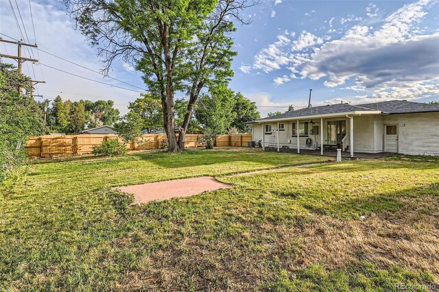 2996 S Sheridan Blvd, Denver, CO 80227 - fenced backyard featuring a patio