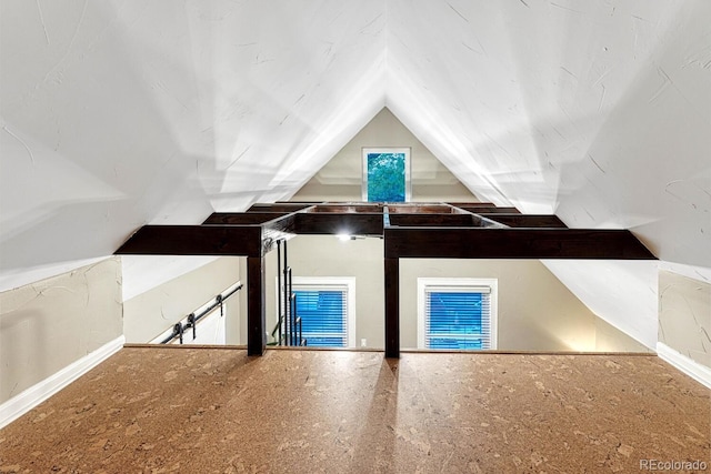 bonus room featuring lofted ceiling