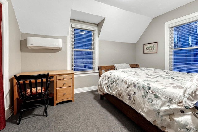 bedroom featuring baseboards, lofted ceiling, a wall mounted AC, and carpet floors