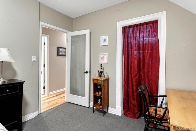 office space featuring baseboards, french doors, and carpet