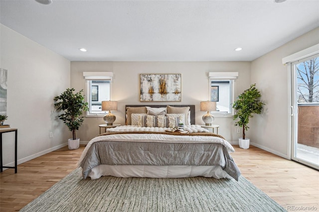 467 Harrison St, Denver, CO 80206 - bedroom with wood finished floors, access to outside, and recessed lighting